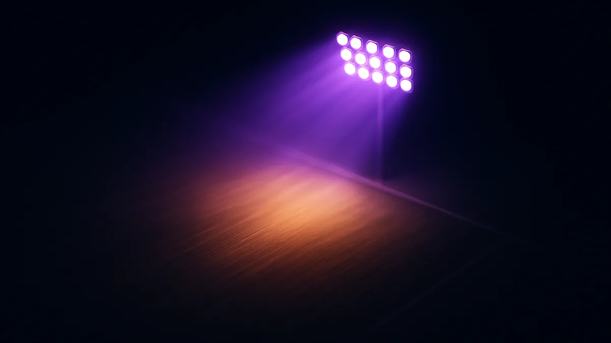 Téléviseur de salon affichant une pelouse de football filmée depuis les hauteurs d'un stade